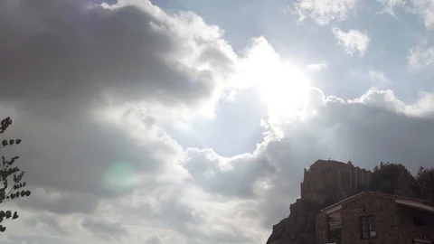 Tmelapse video of stonebuilt monastery on mountains against cloudy sky Stock Footage 93162039