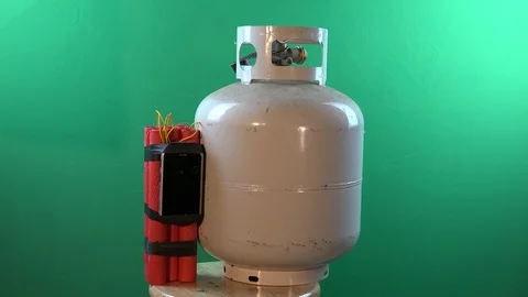 Tnt explosive placed on propane bottle Stock Footage 99313720
