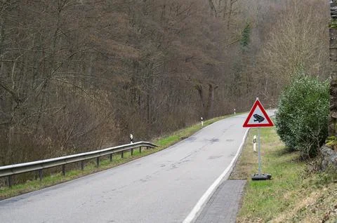 Toad crossing to spawning ground road sign, warning mating season of amphibian Stock Photos