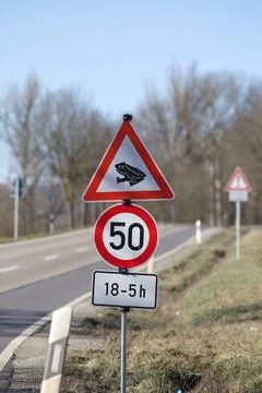 Toad migration warning sign on german street Stock Photos