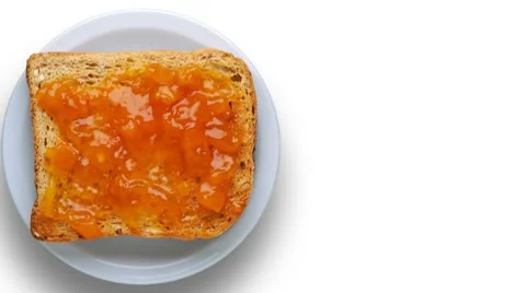 Toast with apricot jam Stock-Footage 8830397