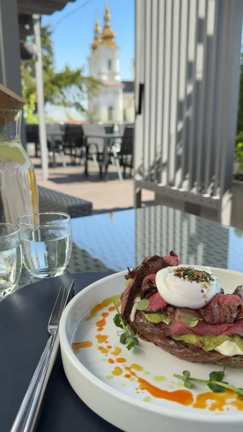 Toast, beef, egg Healthy steak salad brunch plate of steak salad with eggs and Stock Footage 321560633