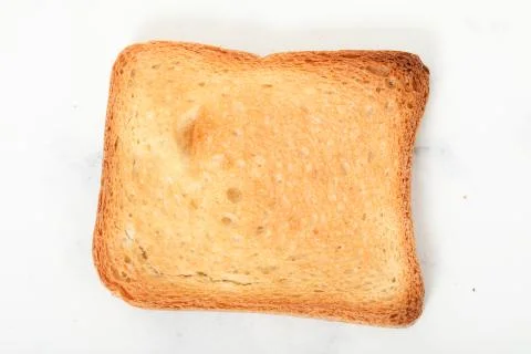 Toast biscuits over white background crunchy food Stock Photos
