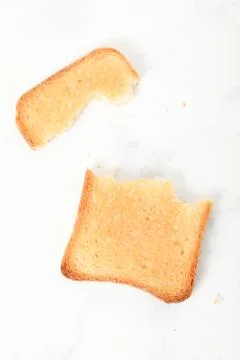 Toast biscuits over white background crunchy food Foto stock