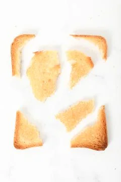Toast biscuits over white background crunchy food Stockfoto's