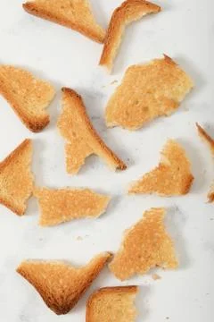 Toast biscuits over white background crunchy food Stock Photos