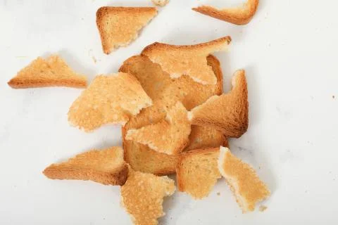 Toast biscuits over white background crunchy food Stock Photos
