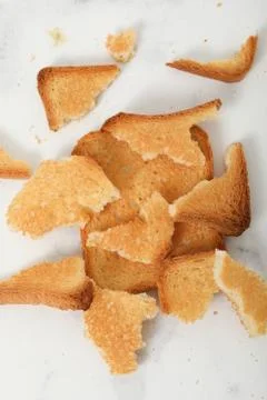 Toast biscuits over white background crunchy food 写真素材