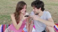 toast - a boy with his girlfriend for their love toast with a glass of red wine HD Footage