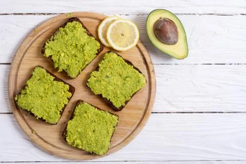 Toast with bread an avocado Stock Photos