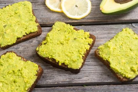 Toast with bread an avocado Stock Photos