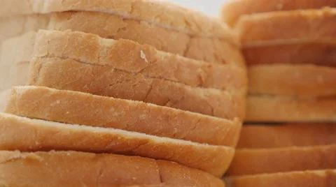 Toast bread slices pile of organic wheat and grain 4K 2160p 30fps UHD footage Stock Footage 63844532