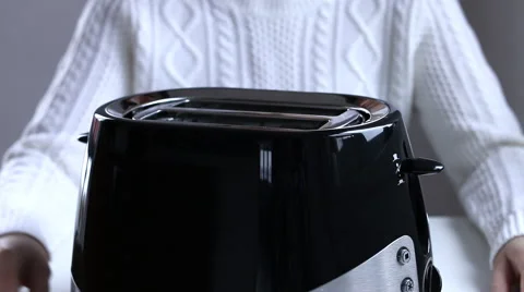 Toast bread in toaster Stock Footage 59827679