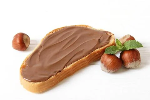 Toast with chocolate paste on the table. Stock Photos