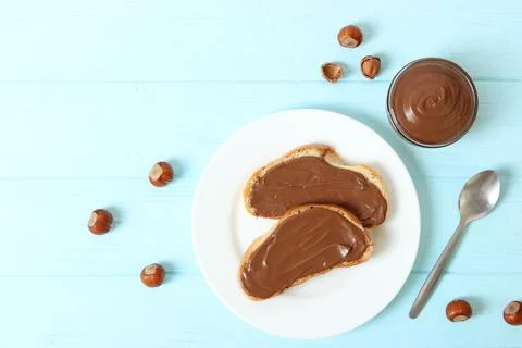 Toast with chocolate paste on the table. Stock-Fotos