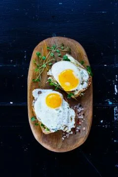 Toast with fried eggs Stock Photos