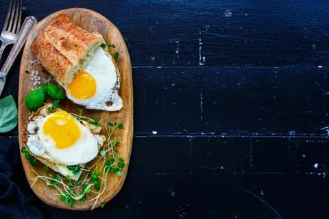 Toast with fried eggs Stock Photos