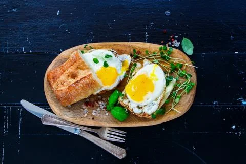 Toast with fried eggs Stock Photos