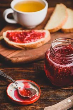 Toast with homemade raspberry jam Stock Photos