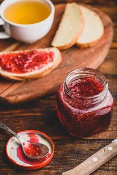 Toast with homemade raspberry jam Stock Photos