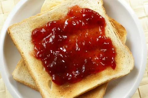 Toast with jam Stock Photos