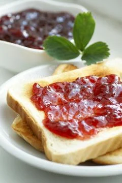 Toast with jam Stock Photos