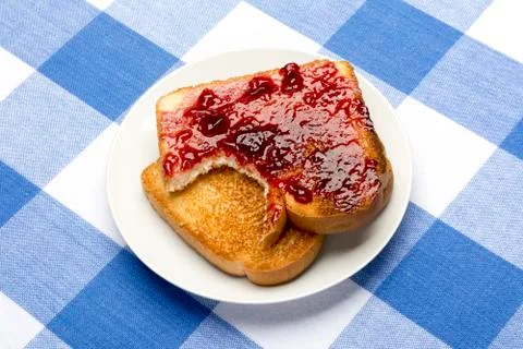 Toast with jam Stock Photos