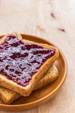 Toast with jam Stock Photos