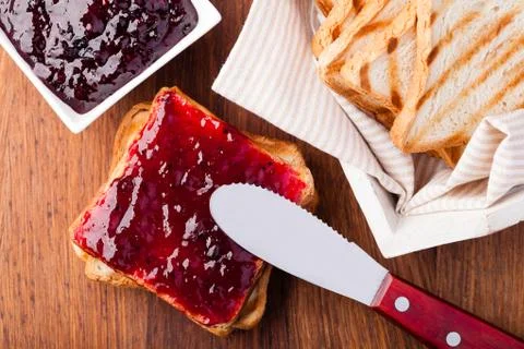 Toast with jam Stock Photos