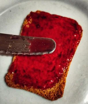 Toast with jam Stock Photos