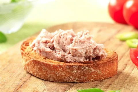 Toast with pink salmon spread on rustic bread Stock Photos
