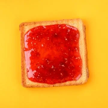 Toast with raspberry jam Stock Photos