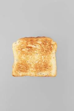 Toast A Slice of toast bread on grey background Copyright: xZoonar.com/J.x... Stock Photos