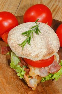 Toast, toast bread with bacon, ham garnished with tomatoes, lettuce and ros.. Stock Photos