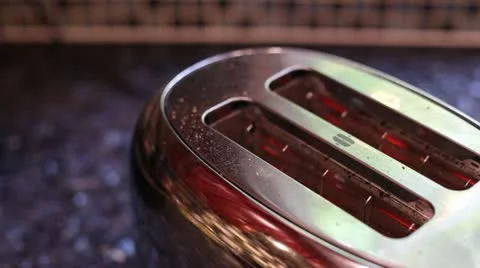 Toast in toaster Stock Footage 21933678