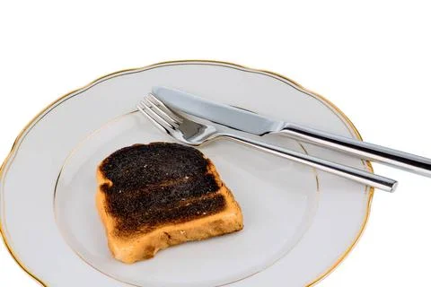 Toastbrot wurde beim toasten verbrannt. Verbrannt eToastscheibe beim Frühs.. Stock Photos