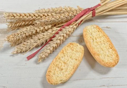 Toasted bread with ears of wheat Stock Photos