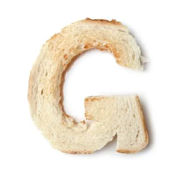 Toasted bread letters on the table Stock Photos