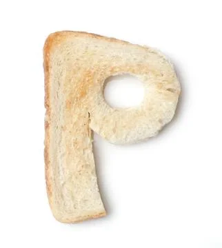 Toasted bread letters on the table Stock Photos