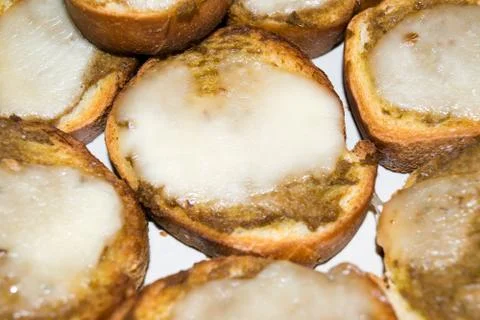 Toasted bread with olive paste and cheese Stock Photos