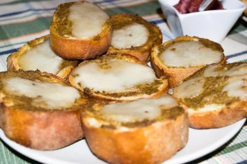 Toasted bread with olive paste and cheese Photos