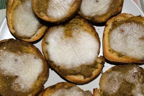 Toasted bread with olive paste and cheese 库存照片