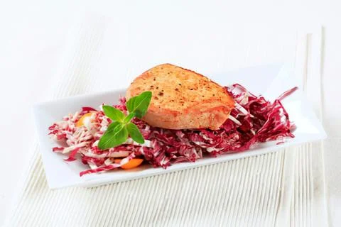 Toasted bread on shredded red cabbage salad Stock Photos