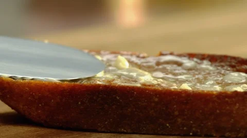 Toasted bread slice buttered Stock Footage 121183795