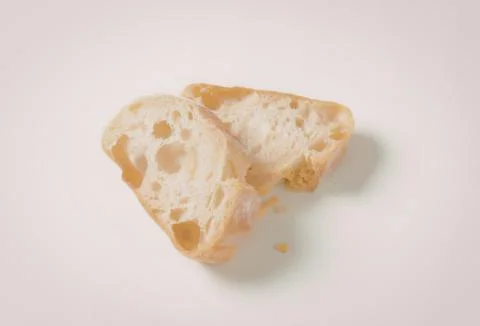 Toasted bread slice with cheese on white Stock Photos