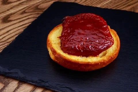 Toasted bread with a slice Stock Photos