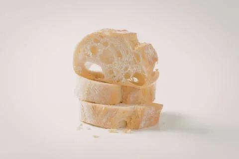 Toasted bread slices with cheese on white Stock Photos