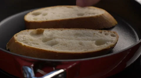 Toasted bread slices for making bruschettas Stock Footage 62810161