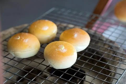 Toasted bread spread on a hot griddle. Fotos de archivo