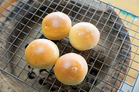 Toasted bread spread on a hot griddle. Fotos de archivo